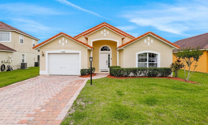 Lake Wilson Preserve House | Affable home with pool, lanai, grill, Pack-N-Play, & kitchen - snowbird-friendly