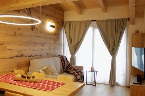 Dosso Veronza Apartment | ALPINE LOFT - Agenzia Dolomiti Affitti