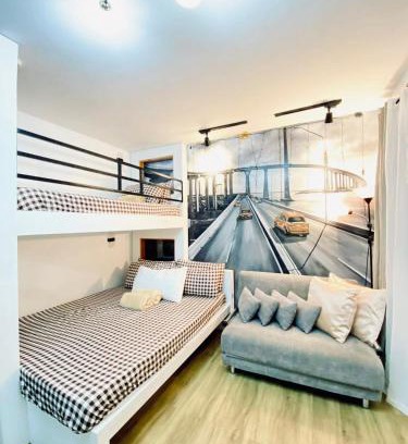 Talisay Apartment | Antara-QueenBed-Balcony-HotShower-WorkCoffee Station-FullKitchen