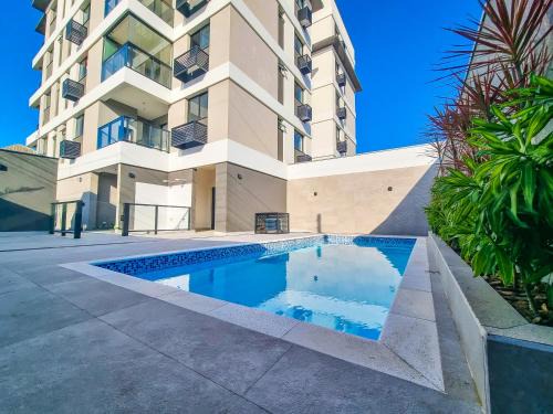 Matinhos Apartment | Apartamento ampla sacada vista mar e piscina em Matinhos PR