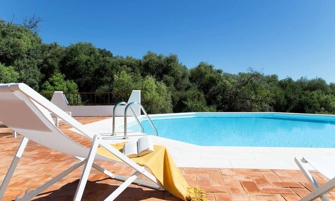 San Pantaleo Apartment | Apartment 'Casa Il Gelsomino San Pantaleo' with Shared Pool, Wi-Fi and Air Conditioning