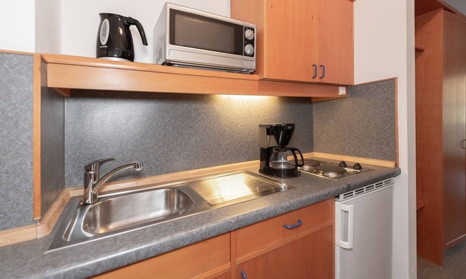 Hohenaschau im Chiemgau Apartment | Apartment Kampenwand Wohn- und Schlafraum mit Balkon, 26 qm, Aufzug im Haus
