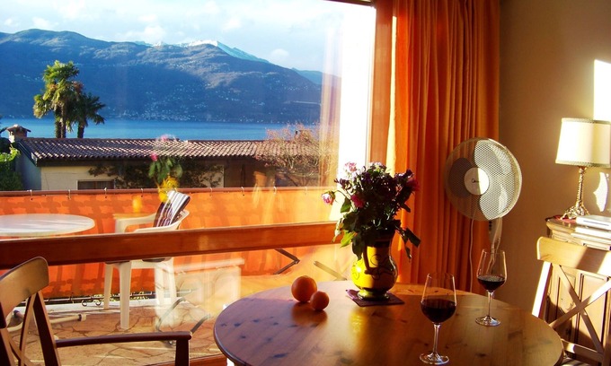 Villaggio Belmonte Apartment | Apartment with a superb lake view, pool and two balconies