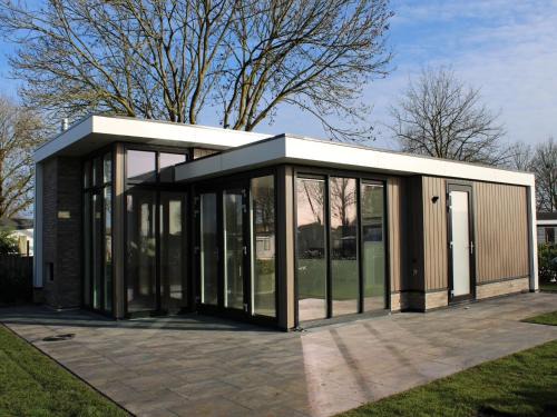 Lathum Ski Chalet | Apartment with Sauna and Terrace in Gelderland