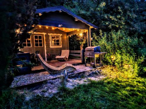 Selk Apartment | Apartments am Selker Noor - mit Naturpark, privater Terrasse und Bachlauf an der Selker Wassermühle