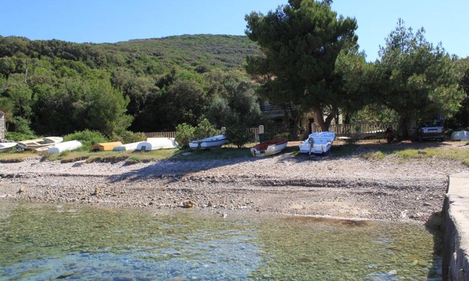Sveti Jakov Apartment | Apartments by the sea Cove Merascica, Cres - 8071