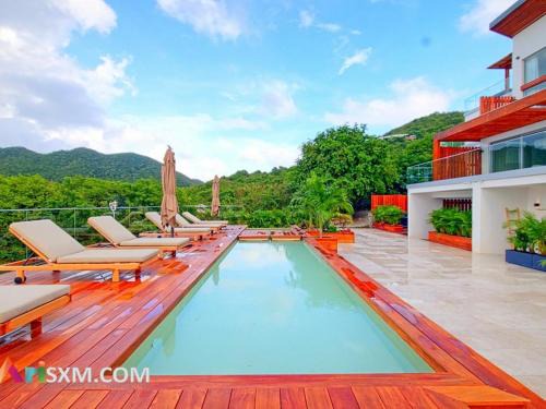 Anse Marcel Apartment | Appartement avec piscine et accès direct à la piscine à débordement - FR-1-734-67