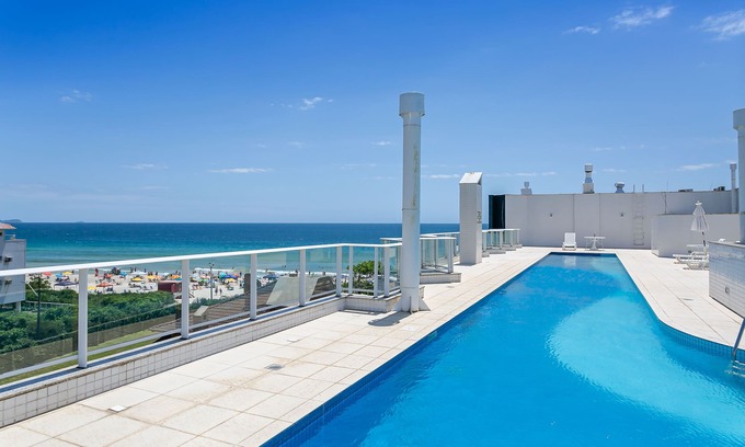 Ingleses Norte Apartment | Aquarelle by Viva Prédio nos Ingleses pé-na-areia com piscina
