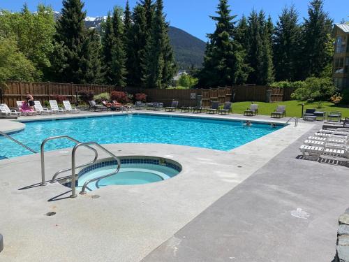 Village North Hotel | Available Thanksgiving Special Cascade Lodge suite WIFI cable TV 2 hot tubs pool gym sauna bike & ski storage room