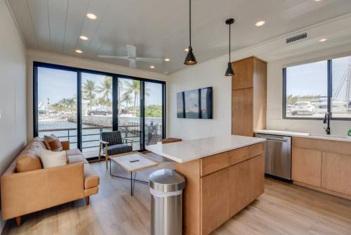 Key West Boat Rental | Awai's Floating Villa - Houseboat in Luxury Village