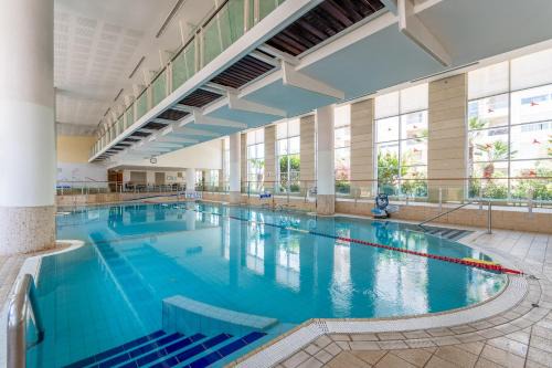 Herzliya Pituach Apartment | Awesome 2BR/2Bath with Pool and Gym