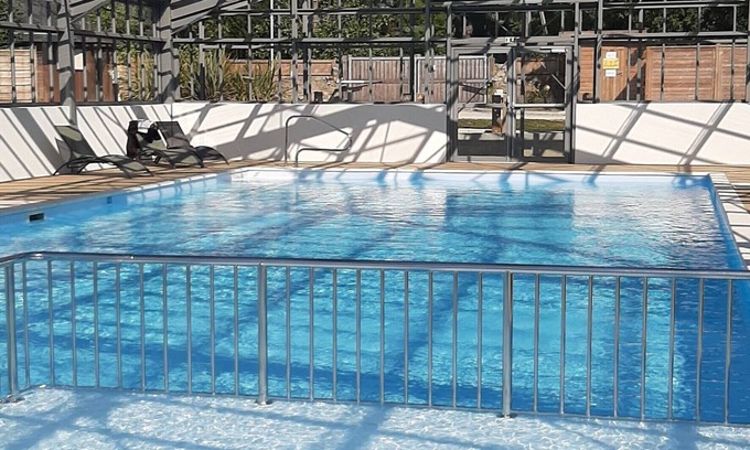 Guerande Ski Chalet | B032 3-bedroom wooden chalet on secure estate with covered swimming pool.