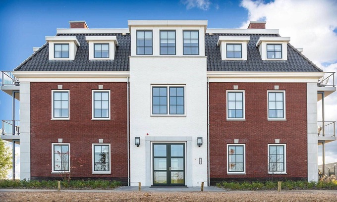 Colijnsplaat Apartment | Beautiful apartment for 4 guests with hot tub, WIFI, TV, balcony and parking