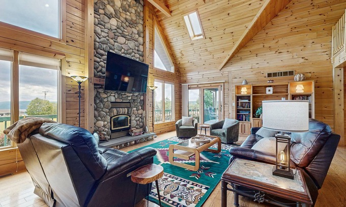 Dundee House | Beautiful lake view home with decks, grill, soaking tub & fireplace