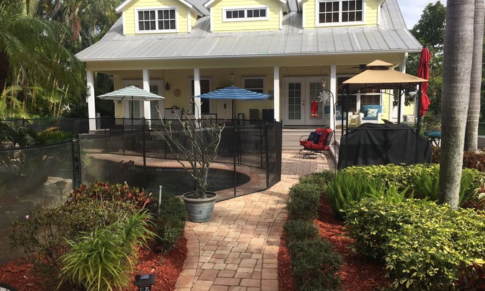 Jensen Beach House | Beautiful private home Heated pool/waterfall & only 5 min to the local beaches.