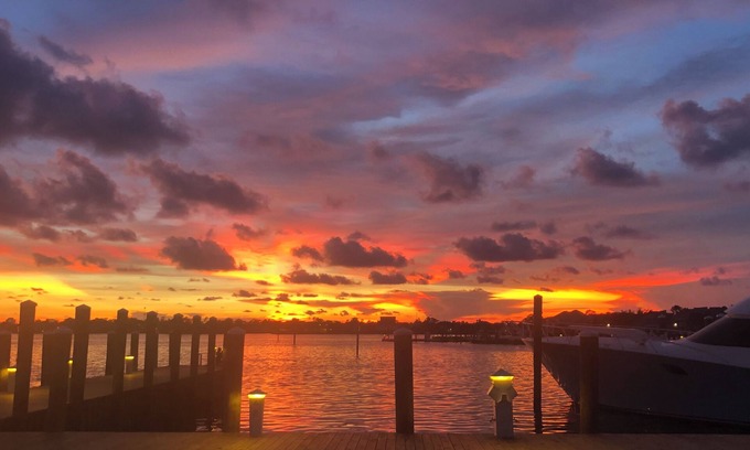 Upper Grand Lagoon Villa | Beautiful sunset waterfront 1st floor marina villa. Quiet safe gated community.