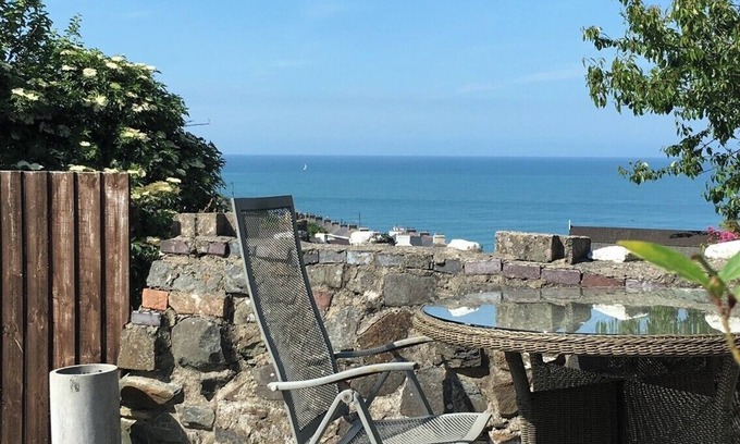 New Quay House | Beautifully decorated, updated period property in New Quay with garden sea views