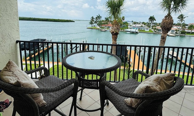 Capri Isle Apartment | Beautifully renovated waterfront owners unit!