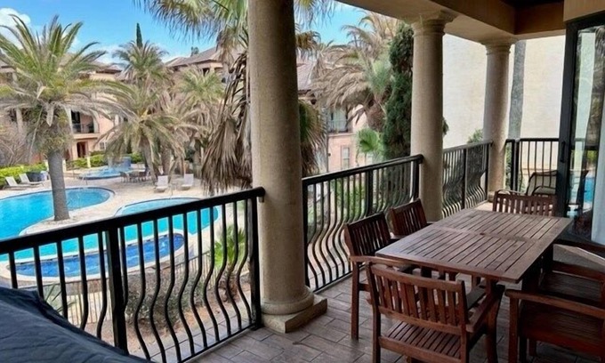 St. Tropez House | Bel Sol Luxury Tuscan-Style Home Steps to Private Tropical Pool by RedAwning