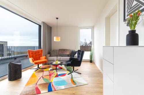 Marienleuchte Apartment | BeltBlick 18 – Ostseeleuchten - Moderne Ferienwohnung mit Dachterrasse direkt an der Ostsee!