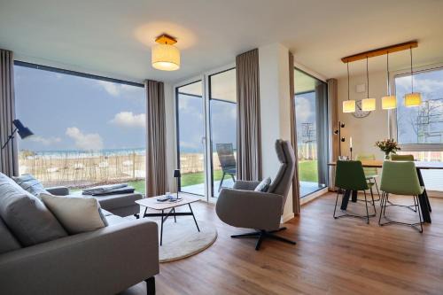 Fehmarn Apartment | BeltBlick 8 - Moderne Ferienwohnung mit unverbauten Meerblick & Sauna!