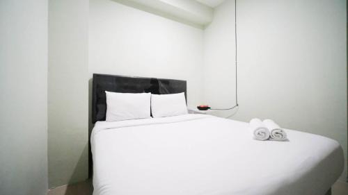 Surabaya Apartment | Best Location and Comfy 2BR at Bale Hinggil Apartment By Travelio