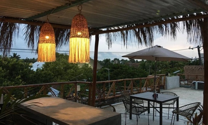 Downtown Holbox Hotel | Black flamingo