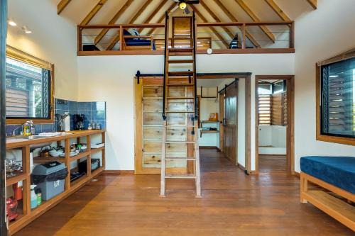 Surfside Apartment | Black Orchid Cabaña at Inn The Trees -Gold Standard Certified