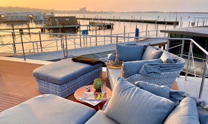 Heiligenhafen Boat Rental | Boat 'Hausboot Inkl Motorboot, Ostsee' with Sea View, Private Terrace and Wi-Fi