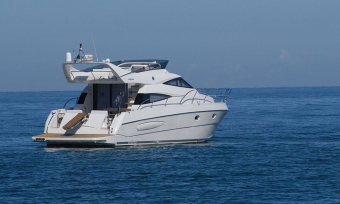 Portisco Boat Rental | Boat "Yacht Raffaelli 54 Fly Bridge" with Private Terrace, Shared Terrace & Wi-Fi