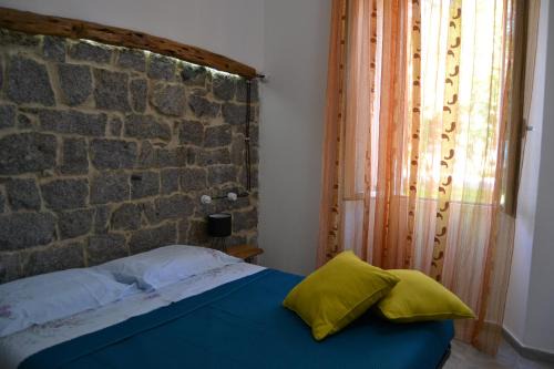 Arbatax Apartment | Borgo Marinaro La Medusa Arbatax - camera matrimoniale con bagno privato-