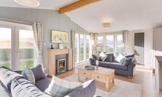 Newton Stewart Ski Chalet | Brand new for 2025. The Aurora lounge is comfortable and flexible.