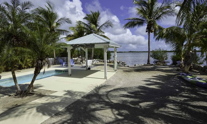 Ramrod Key House | Breezeswept Beach, Waterfront with heated pool