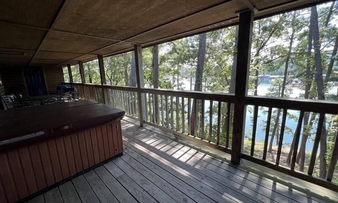 Mount Ida Cottage | C16, Two bedroom, two bath, log-sided Harbor North luxury cottage with hot tub overlooking Lake Ouachita. by RedAwning