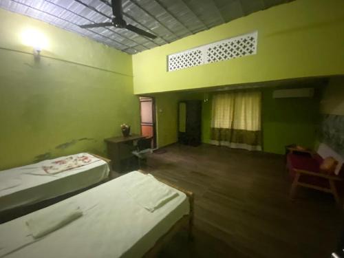 Golaghat Hotel | Camellia bagh resort. Under Pabhojan tea Tourism