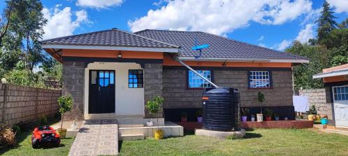 Uasin Gishu House | Camp Flo, Eldoret -Where Comfort Meets Tranquility in a 3-Bedroom Guest Stay -in own compound