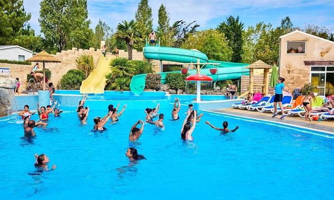 Olonne-sur-Mer House | Campsite Bois Soleil * - Mobile home Grand Large 34.5m2 (3 bedrooms) (- 8 years old) + TV + Terrace 6 persons
