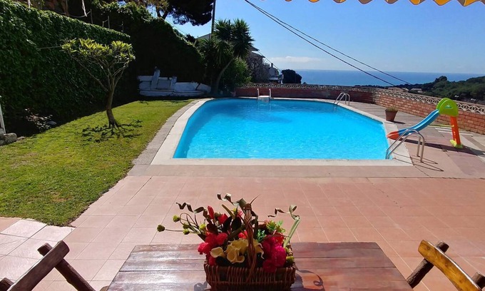 Mataro House | Can Carrion a large pool overlooking the sea
