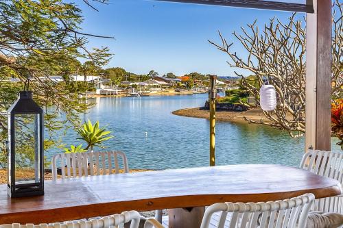 Maroochydore House | Canal Front family Home with extensive outdoor covered areas and pool