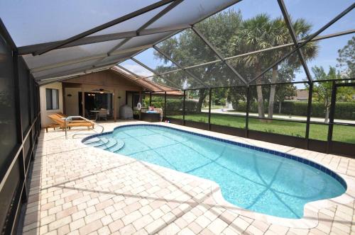 Palm Harbor House | Canal Front Pool Home in Palm Coast