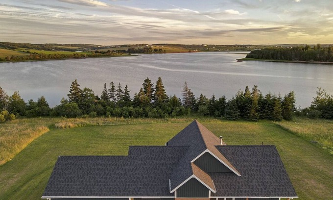 French River House | Cannon Creek - NEW spacious waterfront property with hot-tub.
