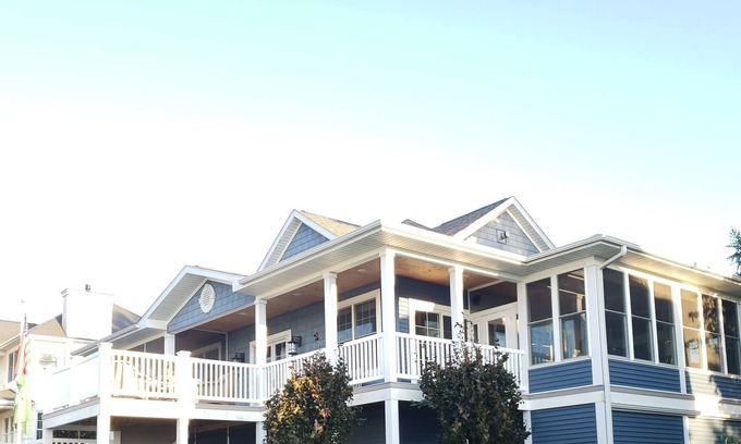 Miami Park House | Carolina Style Home Overlooking Lake Michigan. Hot Tub, Fire Pit, Tram to beach