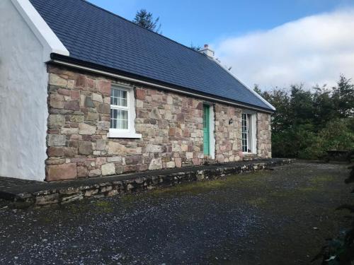 Tourmakeady House | Carraigin Ban