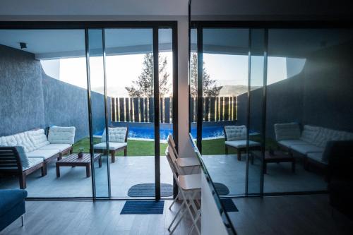 Caleta de Velez House | Casa Aire de Mar, modern house with private pool, overlooking Baviera golf, within walking distance of beach