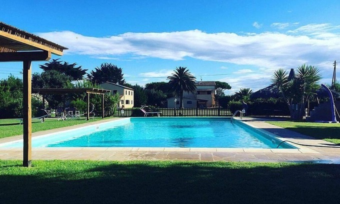 Marina di Castagneto Carducci House | Casa Aneto A: A welcoming apartment surrounded by the greenery, with Free WI-FI.