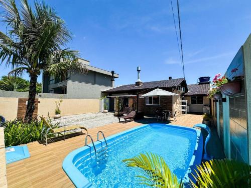 Ze Amandio House | CASA GOLFINHO 348 - casa aconchegante com piscina, churrasqueira, mesa de sinuca e jogos