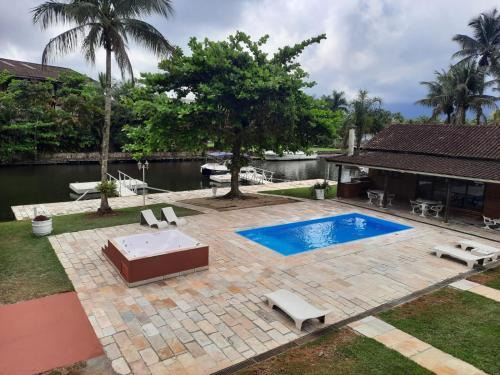 Marina House | Casa na Marina com piscina churrasqueira e píer