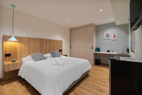 Laureles Hotel | Casa Origo Hospedaje