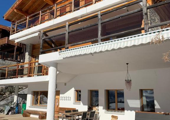Vercorin Ski Chalet | Chalet Fleuris ground floor with garden sauna terrace and Alps view