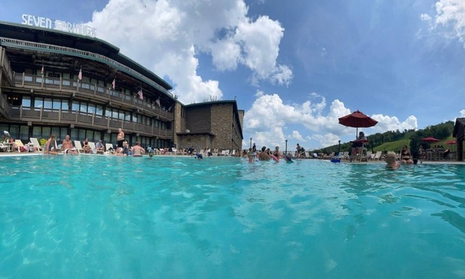Seven Springs Apartment | Champion Hotel | King Suite + Separate Living Area